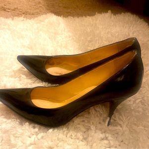 - Christian Louboutin Black Pointed Toe Heels